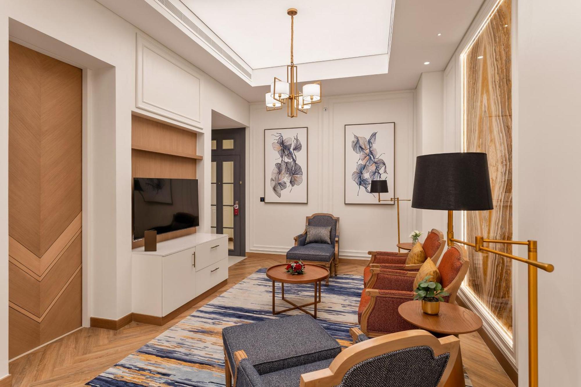 Ajman Hotel & Villas By Blazon Hotels Ngoại thất bức ảnh A living room in a suite at the hotel