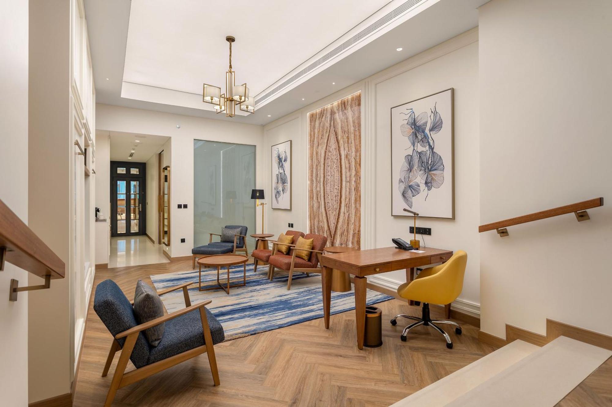 Ajman Hotel & Villas By Blazon Hotels Ngoại thất bức ảnh The interior of a suite at the hotel